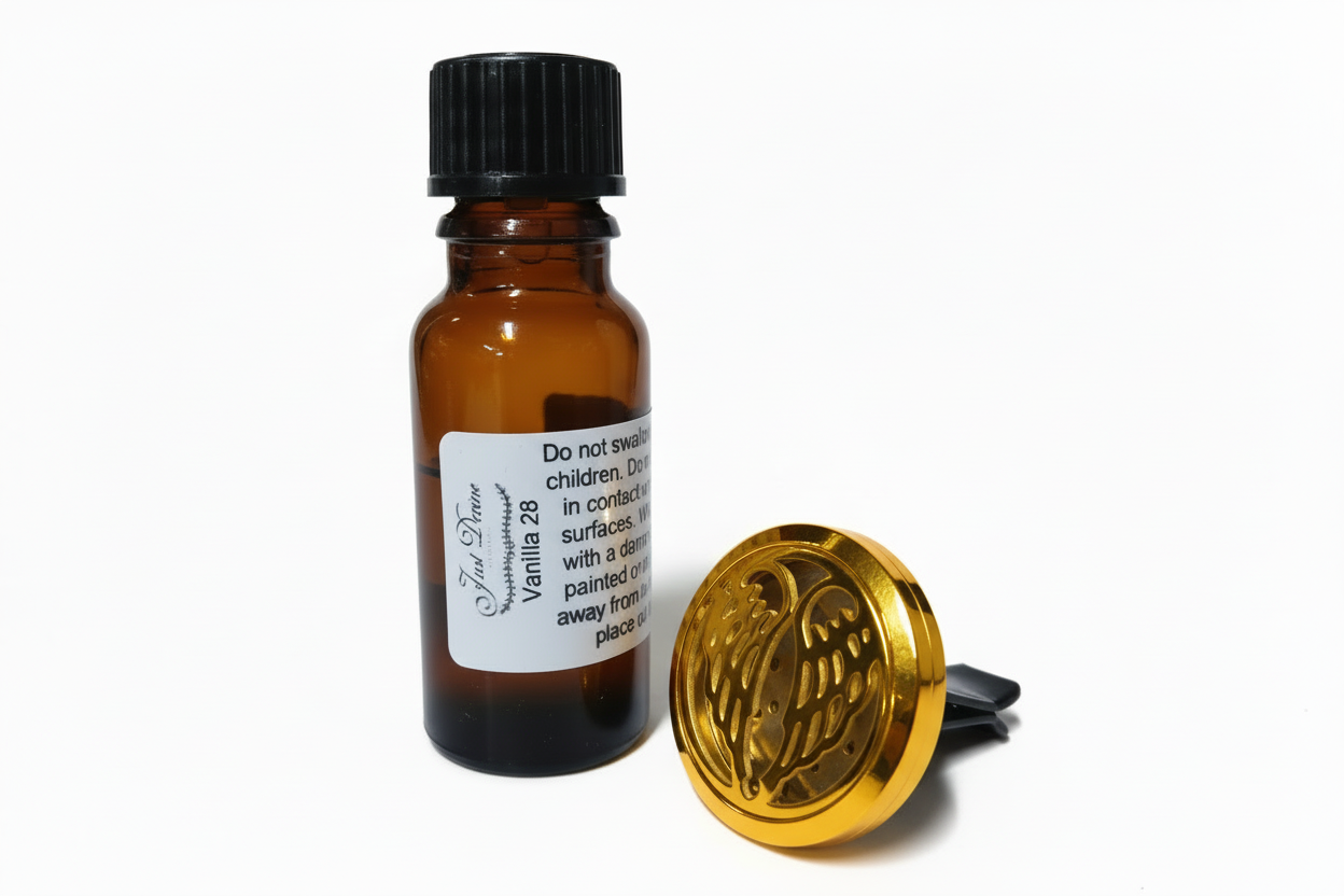 Brown glass bottle with black cap and metal diffuser on a white backgroun