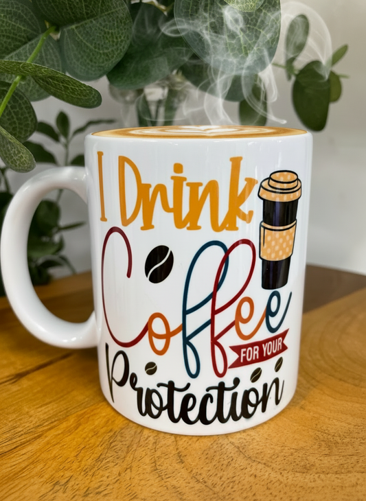 I DRINK COFFEE FOR YOUR PROTECTION COFFEE MUG