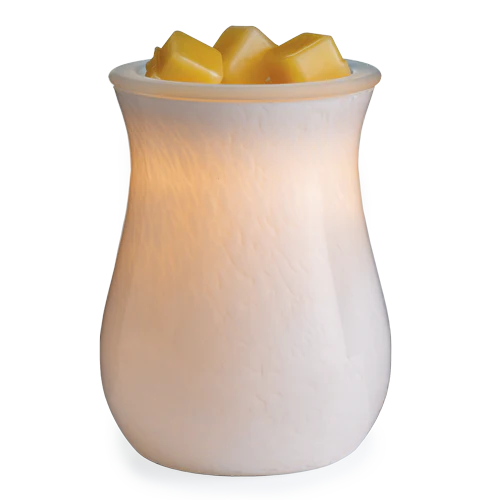 White wax warmer with yellow wax cubes on a white background